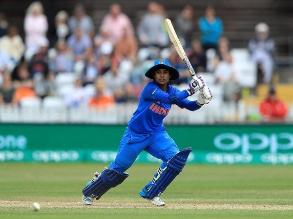 Harmanpreet Kaur lifting ICC Women’s World Cup 2025 trophy after India’s victory against South Africa in Navi Mumbai